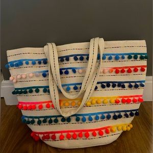Canvas tote bag with pom poms-perfect for a beach day or tropical vacation!